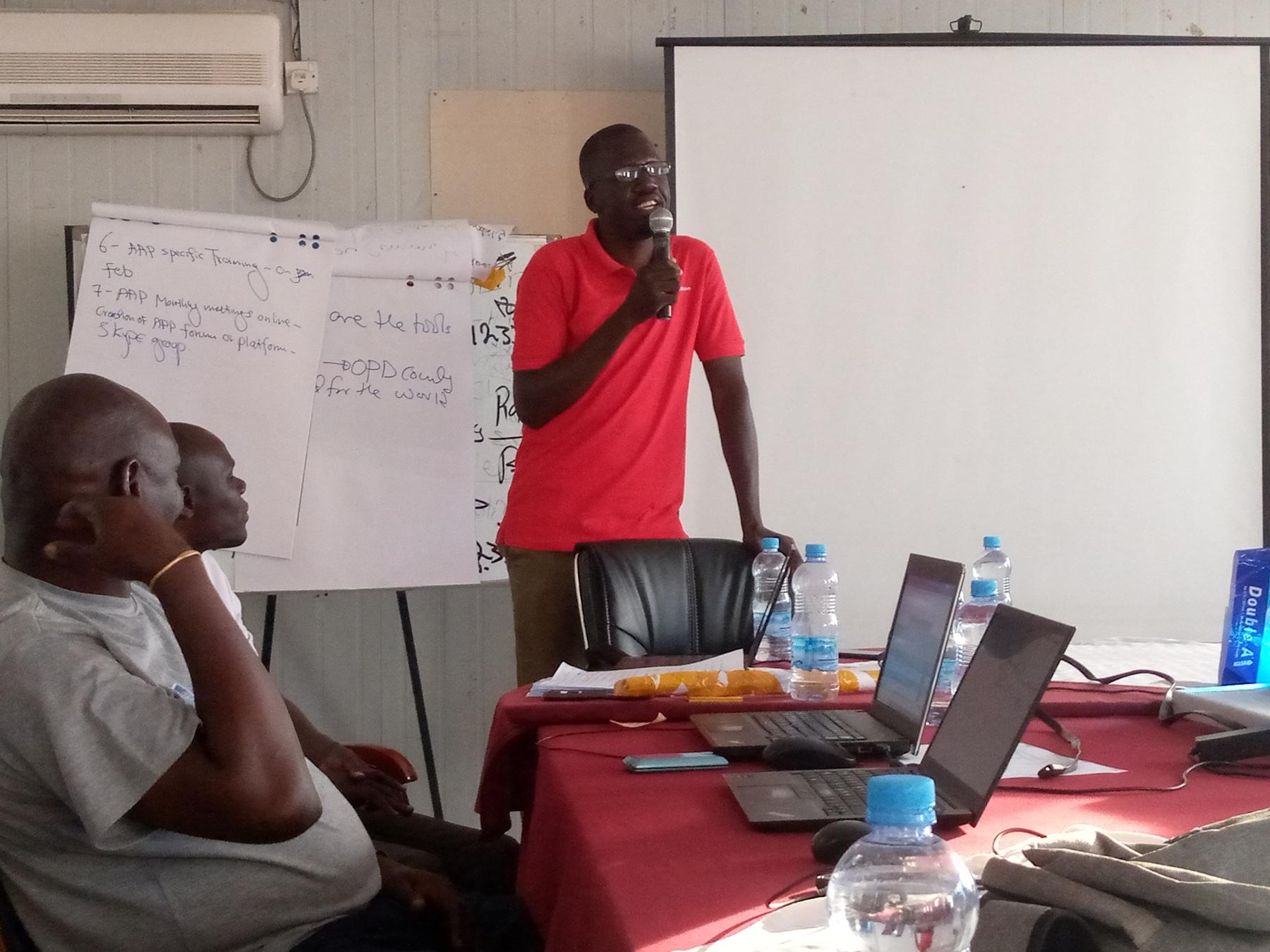 South Sudan Joint Response Coordinator Joseph Kayi speaks at a closing ceremony of JR AAP partners